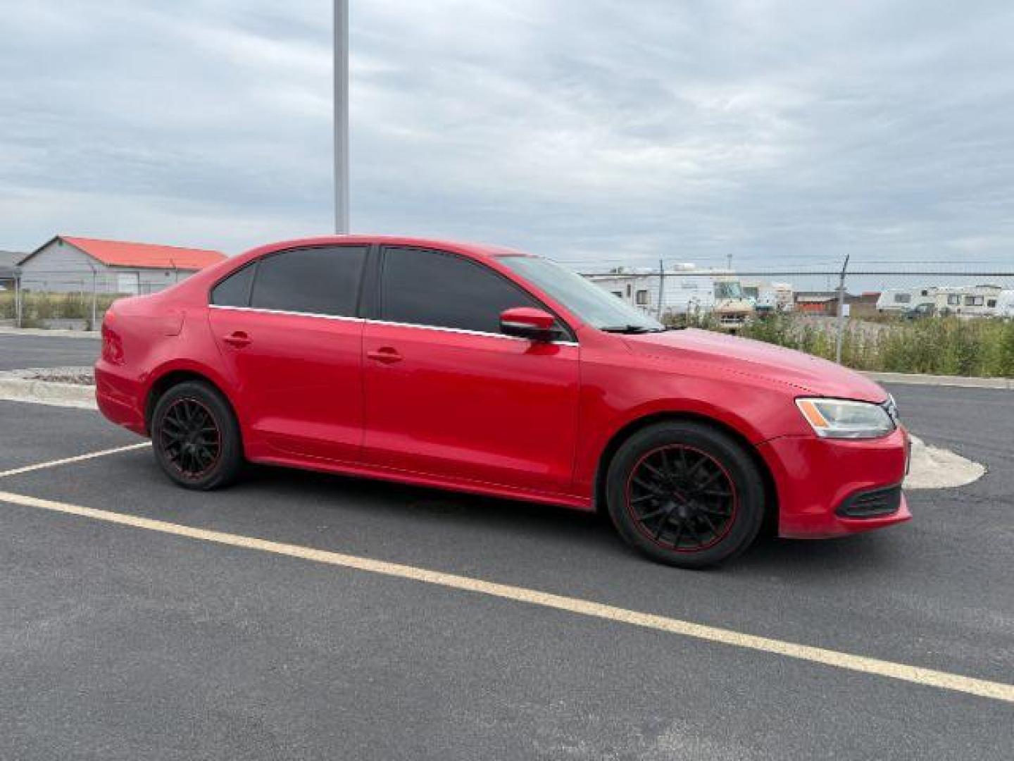 2013 RED /CLOTH Volkswagen Jetta Sedan (3VWDP7AJXDM) with an 25 engine, Automatic transmission, located at 1175 N Woodruff Ave, Idaho Falls, ID, 83401, 43.506901, -111.999657 - At Timberline Auto, finding a great deal on your next vehicle is always easy! Our experienced sales staff's goal is to help find you the right vehicle at the right price! Our knowledgeable finance department has options for almost any credit score. We offer extended service contract options to prote - Photo#0