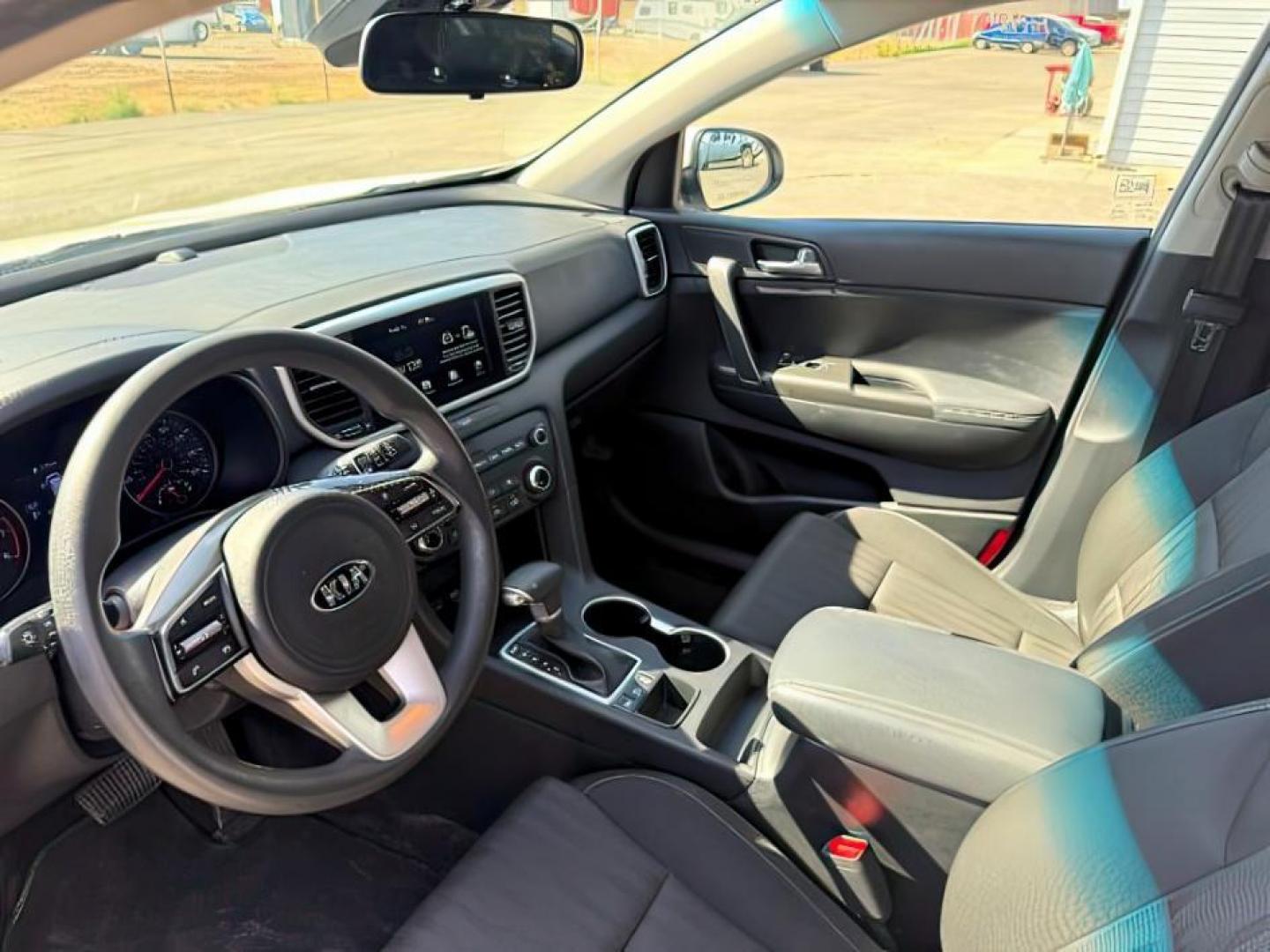 2021 Snow White Pearl /Black KIA Sportage (KNDPMCAC0M7) with an Theta II 24L I-4 gasoline direct injection engine, Automatic transmission, located at 1175 N Woodruff Ave, Idaho Falls, ID, 83401, 43.506901, -111.999657 - At Timberline Auto, finding a great deal on your next vehicle is always easy! Our experienced sales staff's goal is to help find you the right vehicle at the right price! Our knowledgeable finance department has options for almost any credit score. We offer extended service contract options to prote - Photo#12