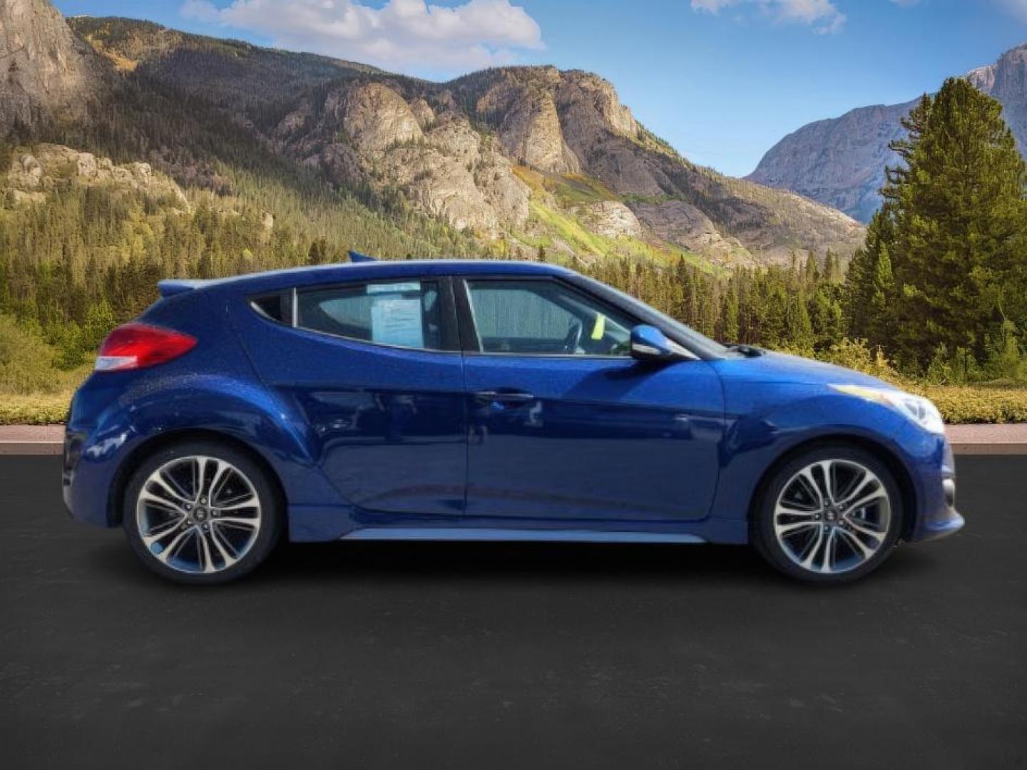 2017 Pacific Blue Pearl /Black Hyundai Veloster (KMHTC6AE0HU) with an 16L I-4 gasoline direct injection engine, Automatic transmission, located at 1175 N Woodruff Ave, Idaho Falls, ID, 83401, 43.506901, -111.999657 - At Timberline Auto, finding a great deal on your next vehicle is always easy! Our experienced sales staff's goal is to help find you the right vehicle at the right price! Our knowledgeable finance department has options for almost any credit score. We offer extended service contract options to prote - Photo#5