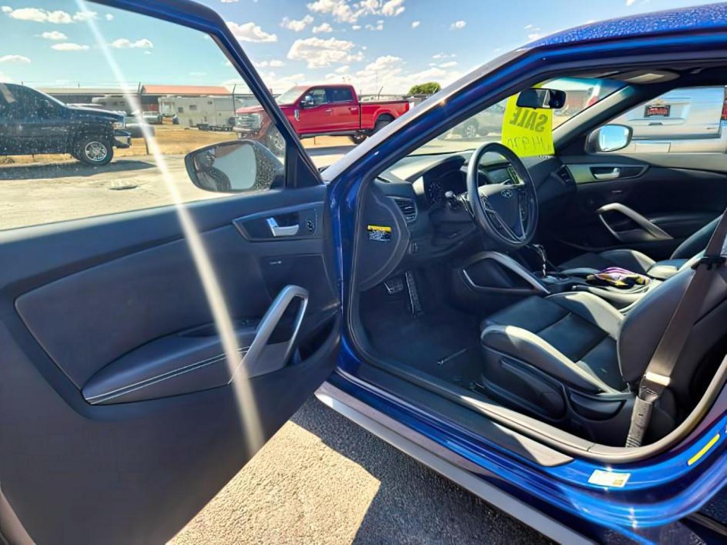 2017 Pacific Blue Pearl /Black Hyundai Veloster (KMHTC6AE0HU) with an 16L I-4 gasoline direct injection engine, Automatic transmission, located at 1175 N Woodruff Ave, Idaho Falls, ID, 83401, 43.506901, -111.999657 - At Timberline Auto, finding a great deal on your next vehicle is always easy! Our experienced sales staff's goal is to help find you the right vehicle at the right price! Our knowledgeable finance department has options for almost any credit score. We offer extended service contract options to prote - Photo#8