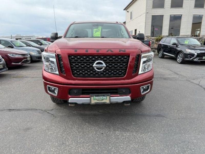 2016 Cayenne Red /Black Nissan Titan XD S (1N6BA1F47GN) with an V8, 5.0L engine, 6-speed automatic transmission, located at 1175 N Woodruff Ave, Idaho Falls, ID, 83401, 43.506901, -111.999657 - <b>Vehicle Details</b><br>Built for hard work and ready for everyday driving, this pre-owned 2016 Nissan Titan XD is a strong choice for drivers seeking capability, comfort, and confidence on the road. Equipped with 4WD and a V8, 5.0L Diesel engine, this Nissan Titan XD delivers impressive towing st- Photo#8