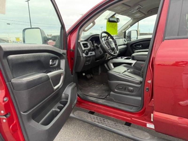 2016 Cayenne Red /Black Nissan Titan XD S (1N6BA1F47GN) with an V8, 5.0L engine, 6-speed automatic transmission, located at 1175 N Woodruff Ave, Idaho Falls, ID, 83401, 43.506901, -111.999657 - <b>Vehicle Details</b><br>Built for hard work and ready for everyday driving, this pre-owned 2016 Nissan Titan XD is a strong choice for drivers seeking capability, comfort, and confidence on the road. Equipped with 4WD and a V8, 5.0L Diesel engine, this Nissan Titan XD delivers impressive towing st- Photo#10