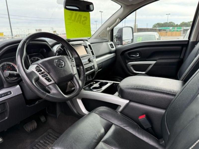 2016 Cayenne Red /Black Nissan Titan XD S (1N6BA1F47GN) with an V8, 5.0L engine, 6-speed automatic transmission, located at 1175 N Woodruff Ave, Idaho Falls, ID, 83401, 43.506901, -111.999657 - <b>Vehicle Details</b><br>Built for hard work and ready for everyday driving, this pre-owned 2016 Nissan Titan XD is a strong choice for drivers seeking capability, comfort, and confidence on the road. Equipped with 4WD and a V8, 5.0L Diesel engine, this Nissan Titan XD delivers impressive towing st- Photo#12
