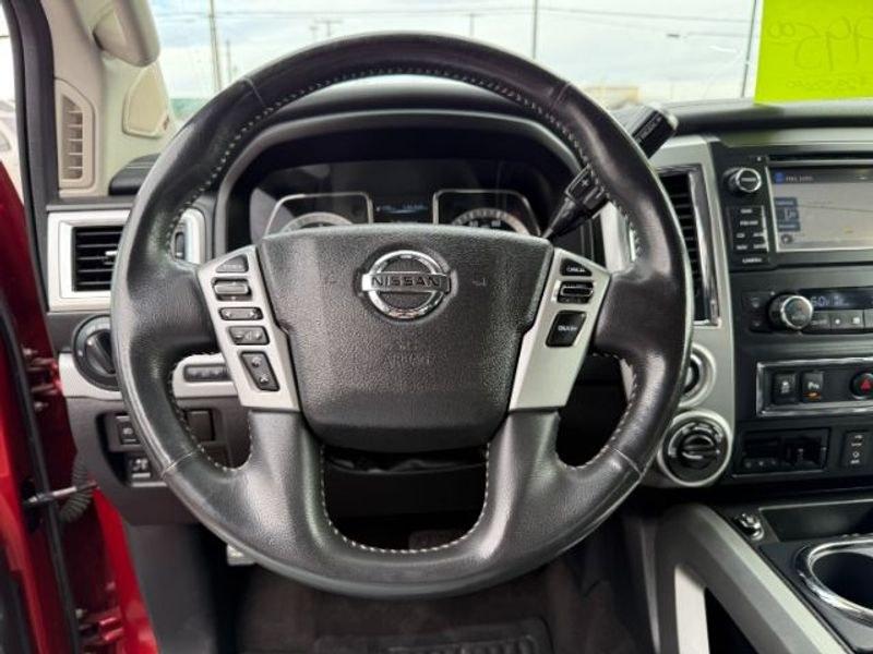 2016 Cayenne Red /Black Nissan Titan XD S (1N6BA1F47GN) with an V8, 5.0L engine, 6-speed automatic transmission, located at 1175 N Woodruff Ave, Idaho Falls, ID, 83401, 43.506901, -111.999657 - <b>Vehicle Details</b><br>Built for hard work and ready for everyday driving, this pre-owned 2016 Nissan Titan XD is a strong choice for drivers seeking capability, comfort, and confidence on the road. Equipped with 4WD and a V8, 5.0L Diesel engine, this Nissan Titan XD delivers impressive towing st- Photo#13