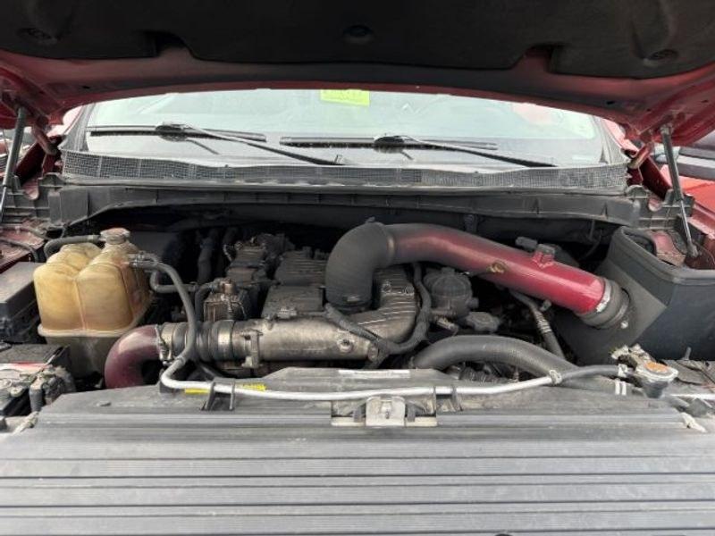2016 Cayenne Red /Black Nissan Titan XD S (1N6BA1F47GN) with an V8, 5.0L engine, 6-speed automatic transmission, located at 1175 N Woodruff Ave, Idaho Falls, ID, 83401, 43.506901, -111.999657 - <b>Vehicle Details</b><br>Built for hard work and ready for everyday driving, this pre-owned 2016 Nissan Titan XD is a strong choice for drivers seeking capability, comfort, and confidence on the road. Equipped with 4WD and a V8, 5.0L Diesel engine, this Nissan Titan XD delivers impressive towing st- Photo#20