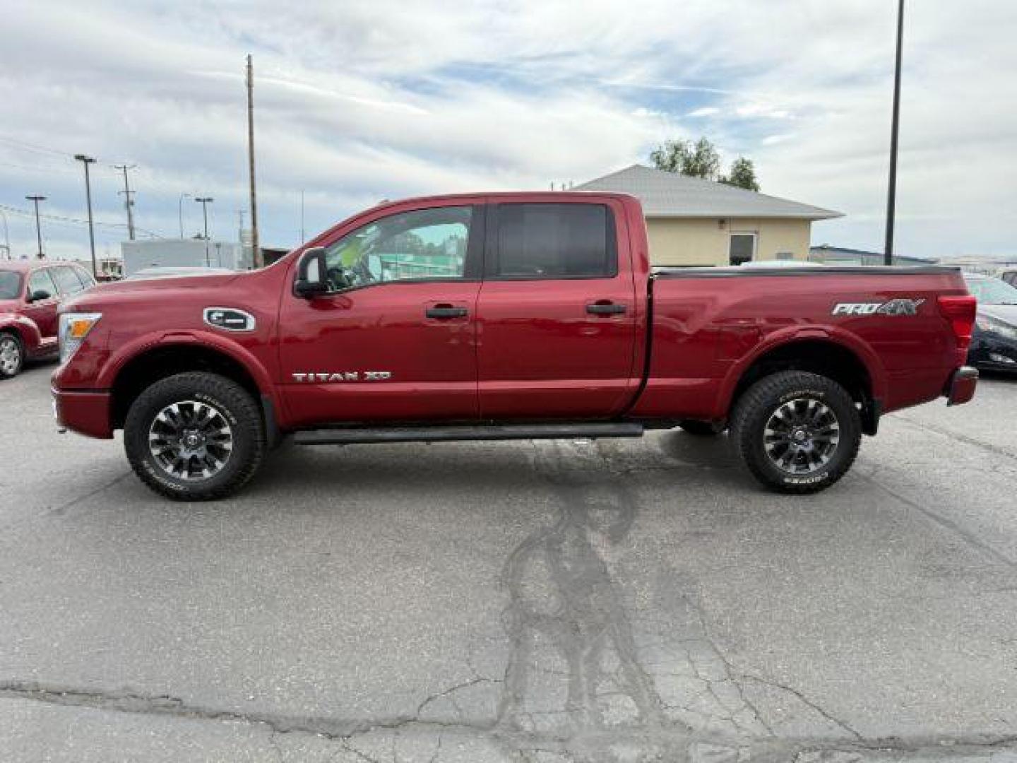 2016 RED /LEATHER Nissan Titan XD (1N6BA1F47GN) with an 50 engine, Automatic transmission, located at 1175 N Woodruff Ave, Idaho Falls, ID, 83401, 43.506901, -111.999657 - At Timberline Auto, finding a great deal on your next vehicle is always easy! Our experienced sales staff's goal is to help find you the right vehicle at the right price! Our knowledgeable finance department has options for almost any credit score. We offer extended service contract options to prote - Photo#22