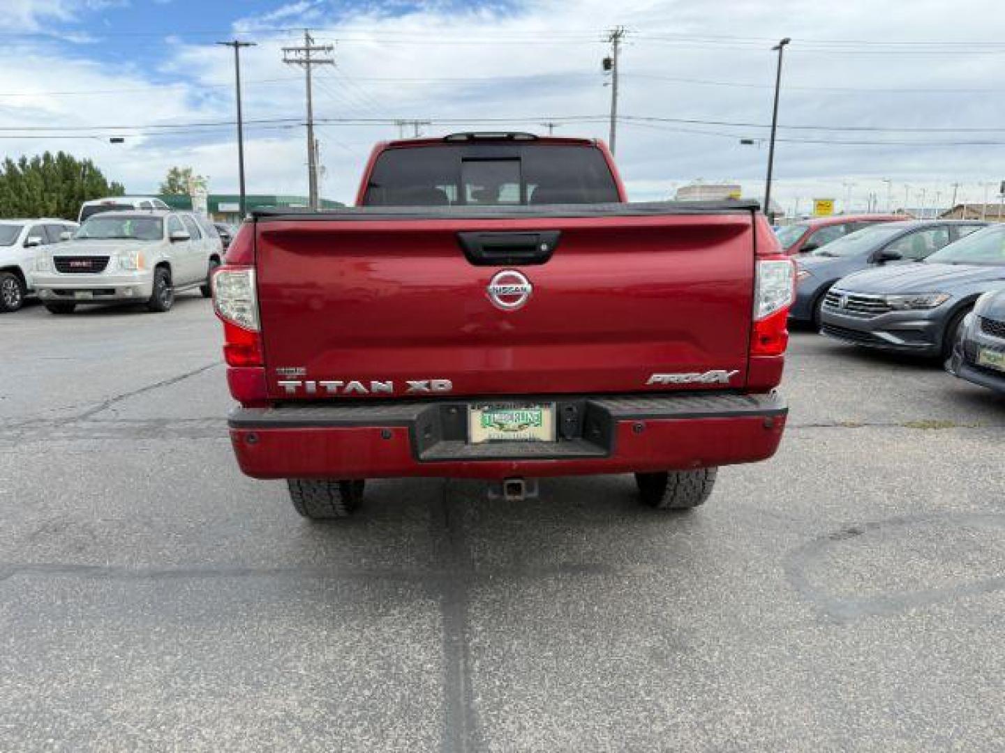 2016 RED /LEATHER Nissan Titan XD (1N6BA1F47GN) with an 50 engine, Automatic transmission, located at 1175 N Woodruff Ave, Idaho Falls, ID, 83401, 43.506901, -111.999657 - At Timberline Auto, finding a great deal on your next vehicle is always easy! Our experienced sales staff's goal is to help find you the right vehicle at the right price! Our knowledgeable finance department has options for almost any credit score. We offer extended service contract options to prote - Photo#24