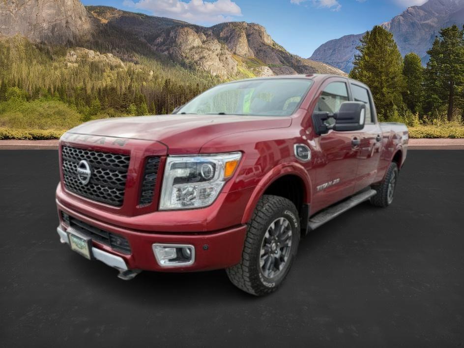 2016 RED /LEATHER Nissan Titan XD (1N6BA1F47GN) with an 50 engine, Automatic transmission, located at 1175 N Woodruff Ave, Idaho Falls, ID, 83401, 43.506901, -111.999657 - At Timberline Auto, finding a great deal on your next vehicle is always easy! Our experienced sales staff's goal is to help find you the right vehicle at the right price! Our knowledgeable finance department has options for almost any credit score. We offer extended service contract options to prote - Photo#0
