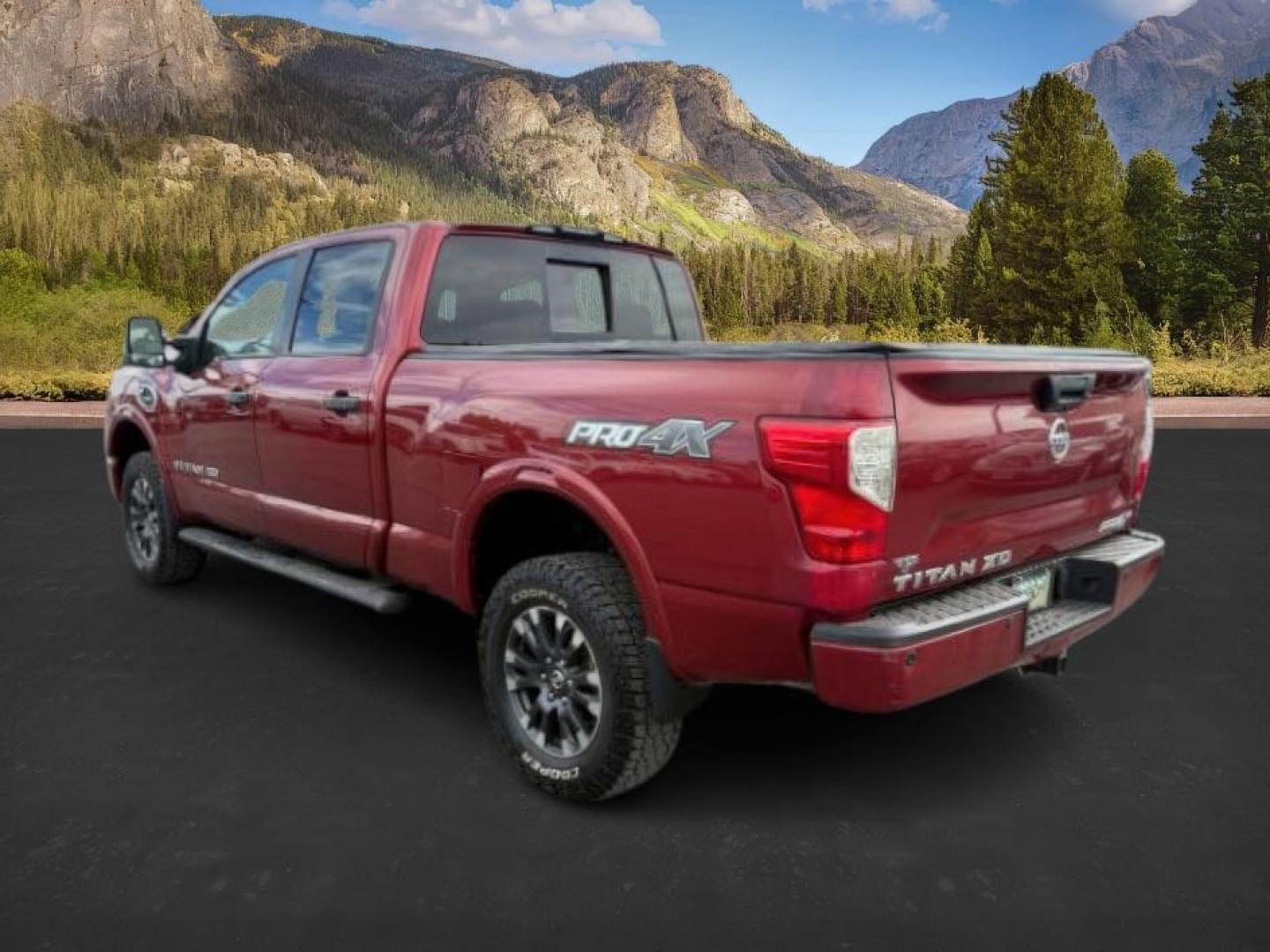 2016 RED /LEATHER Nissan Titan XD (1N6BA1F47GN) with an 50 engine, Automatic transmission, located at 1175 N Woodruff Ave, Idaho Falls, ID, 83401, 43.506901, -111.999657 - At Timberline Auto, finding a great deal on your next vehicle is always easy! Our experienced sales staff's goal is to help find you the right vehicle at the right price! Our knowledgeable finance department has options for almost any credit score. We offer extended service contract options to prote - Photo#2