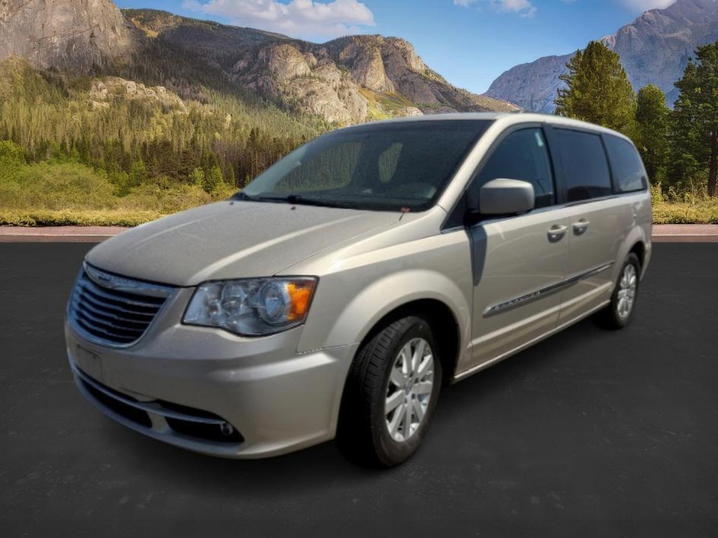 2016 GOLD /Black/Light Graystone Chrysler Town Country (2C4RC1BG0GR) with an Pentastar 36L V-6 DOHC engine, Automatic transmission, located at 1175 N Woodruff Ave, Idaho Falls, ID, 83401, 43.506901, -111.999657 - At Timberline Auto, finding a great deal on your next vehicle is always easy! Our experienced sales staff's goal is to help find you the right vehicle at the right price! Our knowledgeable finance department has options for almost any credit score. We offer extended service contract options to prote - Photo#0