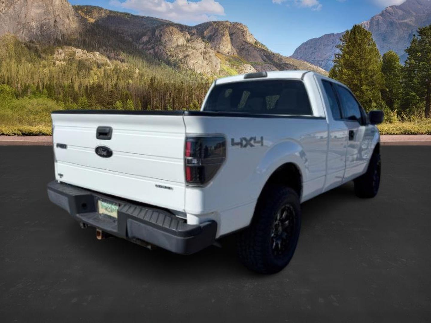 2011 Oxford White /Steel Grey Ford F-150 (1FTFX1EF7BF) with an 5L V-8 DOHC engine, Automatic transmission, located at 1175 N Woodruff Ave, Idaho Falls, ID, 83401, 43.506901, -111.999657 - At Timberline Auto, finding a great deal on your next vehicle is always easy! Our experienced sales staff's goal is to help find you the right vehicle at the right price! Our knowledgeable finance department has options for almost any credit score. We offer extended service contract options to prote - Photo#4