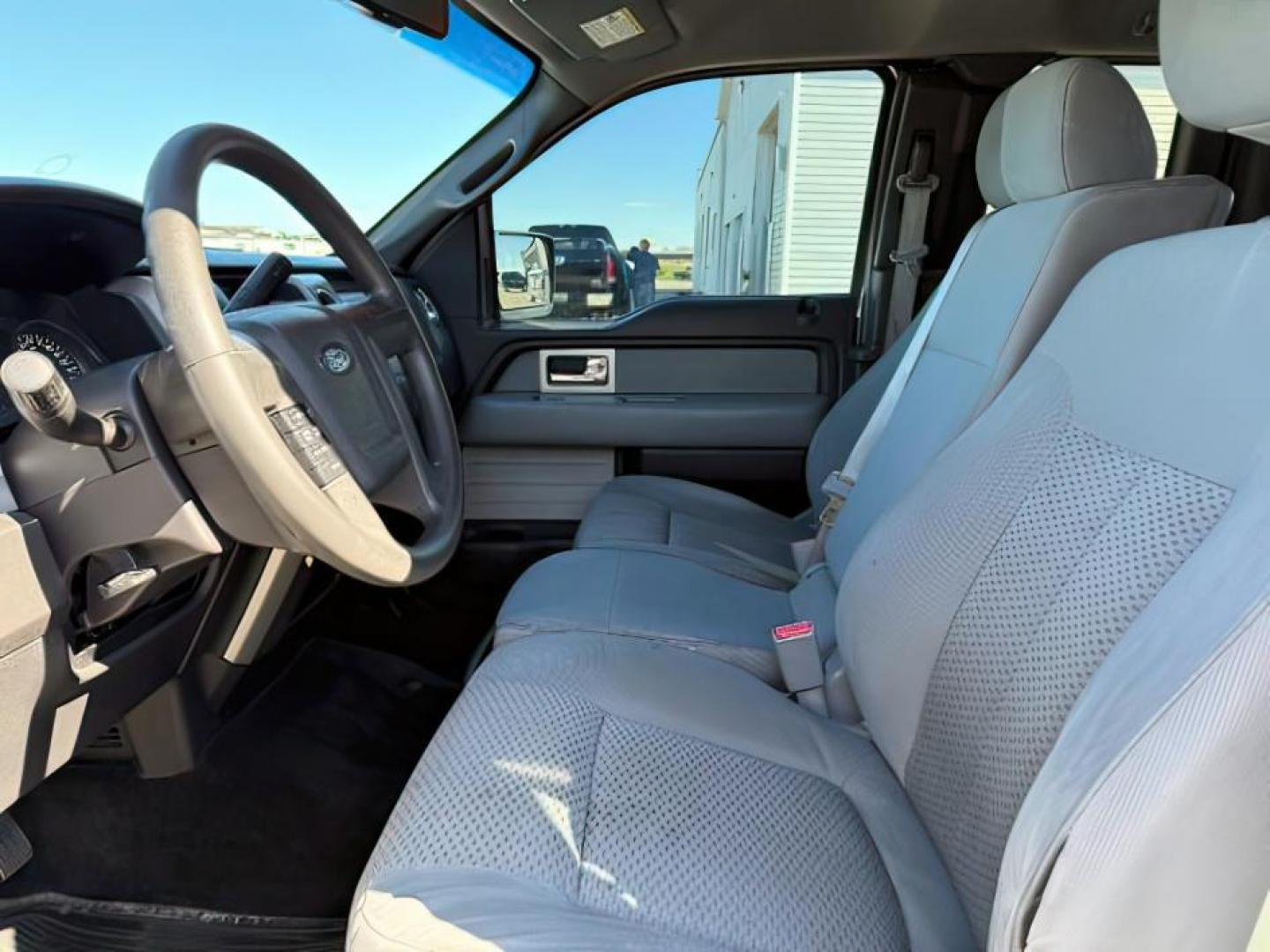 2011 Oxford White /Steel Grey Ford F-150 (1FTFX1EF7BF) with an 5L V-8 DOHC engine, Automatic transmission, located at 1175 N Woodruff Ave, Idaho Falls, ID, 83401, 43.506901, -111.999657 - At Timberline Auto, finding a great deal on your next vehicle is always easy! Our experienced sales staff's goal is to help find you the right vehicle at the right price! Our knowledgeable finance department has options for almost any credit score. We offer extended service contract options to prote - Photo#10