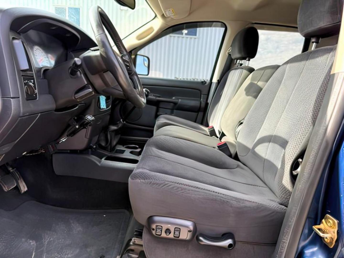 2005 BLUE /CLOTH Dodge Ram 2500 (3D7KS28C05G) with an 59 engine, Manual transmission, located at 1175 N Woodruff Ave, Idaho Falls, ID, 83401, 43.506901, -111.999657 - At Timberline Auto, finding a great deal on your next vehicle is always easy! Our experienced sales staff's goal is to help find you the right vehicle at the right price! Our knowledgeable finance department has options for almost any credit score. We offer extended service contract options to prote - Photo#9