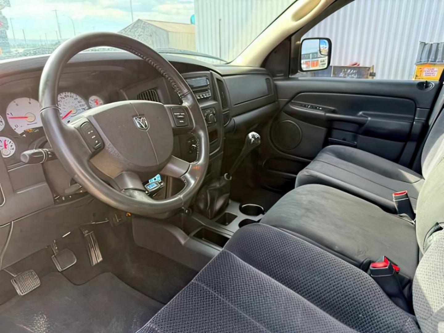 2005 BLUE /CLOTH Dodge Ram 2500 (3D7KS28C05G) with an 59 engine, Manual transmission, located at 1175 N Woodruff Ave, Idaho Falls, ID, 83401, 43.506901, -111.999657 - At Timberline Auto, finding a great deal on your next vehicle is always easy! Our experienced sales staff's goal is to help find you the right vehicle at the right price! Our knowledgeable finance department has options for almost any credit score. We offer extended service contract options to prote - Photo#10