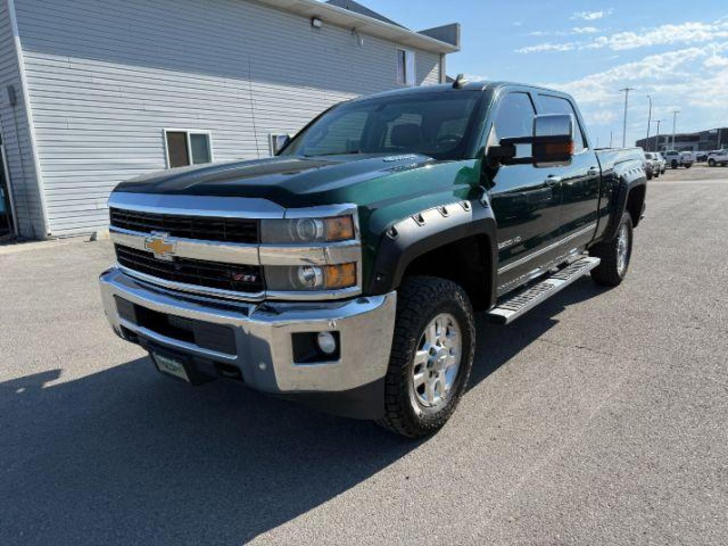 2015 GREEN /Jet Black Chevrolet Silverado 2500HD (1GC1KWE89FF) with an 66 engine, Automatic transmission, located at 1175 N Woodruff Ave, Idaho Falls, ID, 83401, 43.506901, -111.999657 - At Timberline Auto, finding a great deal on your next vehicle is always easy! Our experienced sales staff's goal is to help find you the right vehicle at the right price! Our knowledgeable finance department has options for almost any credit score. We offer extended service contract options to prote - Photo#19