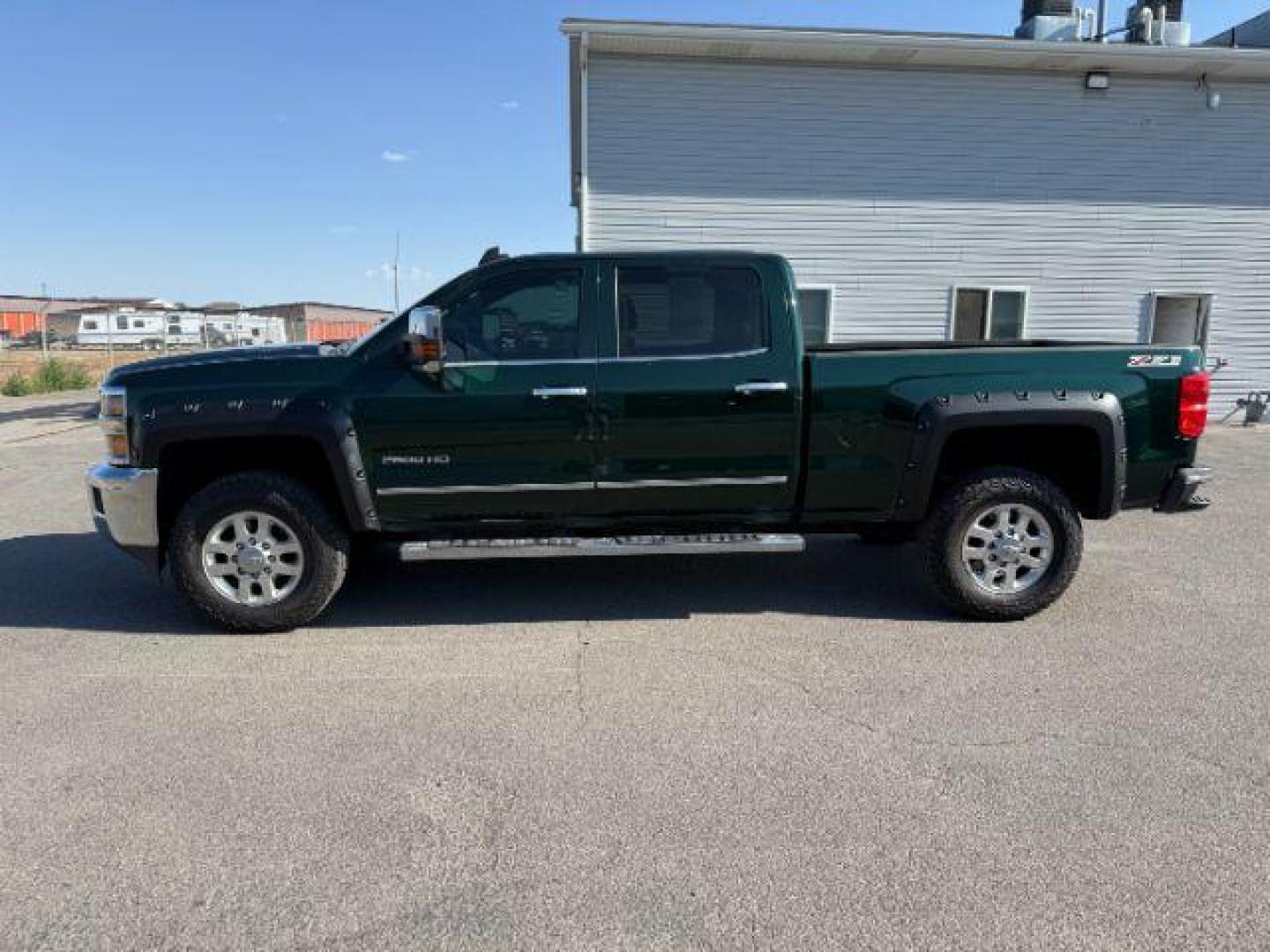 2015 GREEN /Jet Black Chevrolet Silverado 2500HD (1GC1KWE89FF) with an 66 engine, Automatic transmission, located at 1175 N Woodruff Ave, Idaho Falls, ID, 83401, 43.506901, -111.999657 - At Timberline Auto, finding a great deal on your next vehicle is always easy! Our experienced sales staff's goal is to help find you the right vehicle at the right price! Our knowledgeable finance department has options for almost any credit score. We offer extended service contract options to prote - Photo#20