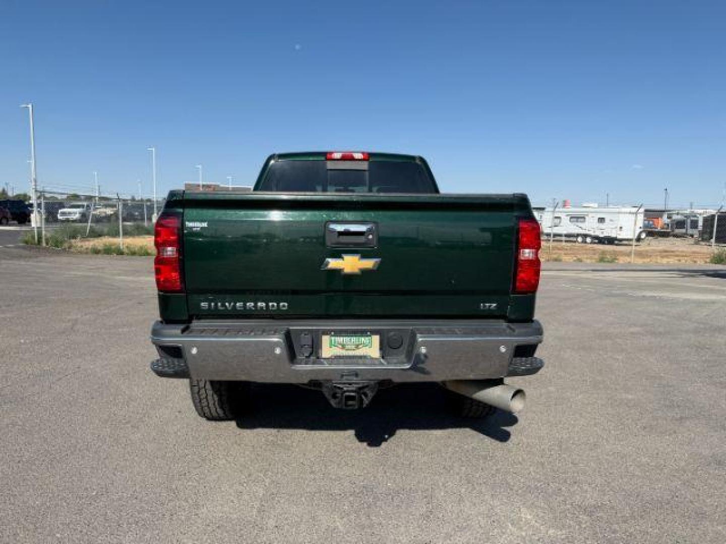 2015 GREEN /Jet Black Chevrolet Silverado 2500HD (1GC1KWE89FF) with an 66 engine, Automatic transmission, located at 1175 N Woodruff Ave, Idaho Falls, ID, 83401, 43.506901, -111.999657 - At Timberline Auto, finding a great deal on your next vehicle is always easy! Our experienced sales staff's goal is to help find you the right vehicle at the right price! Our knowledgeable finance department has options for almost any credit score. We offer extended service contract options to prote - Photo#22