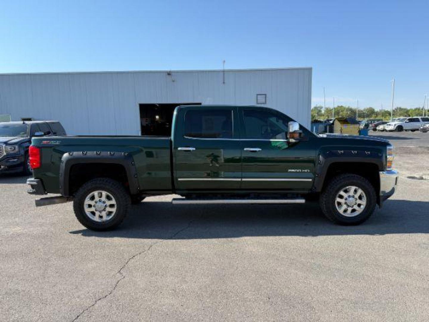 2015 GREEN /Jet Black Chevrolet Silverado 2500HD (1GC1KWE89FF) with an 66 engine, Automatic transmission, located at 1175 N Woodruff Ave, Idaho Falls, ID, 83401, 43.506901, -111.999657 - At Timberline Auto, finding a great deal on your next vehicle is always easy! Our experienced sales staff's goal is to help find you the right vehicle at the right price! Our knowledgeable finance department has options for almost any credit score. We offer extended service contract options to prote - Photo#25