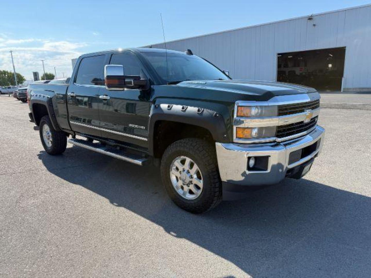 2015 GREEN /Jet Black Chevrolet Silverado 2500HD (1GC1KWE89FF) with an 66 engine, Automatic transmission, located at 1175 N Woodruff Ave, Idaho Falls, ID, 83401, 43.506901, -111.999657 - At Timberline Auto, finding a great deal on your next vehicle is always easy! Our experienced sales staff's goal is to help find you the right vehicle at the right price! Our knowledgeable finance department has options for almost any credit score. We offer extended service contract options to prote - Photo#26