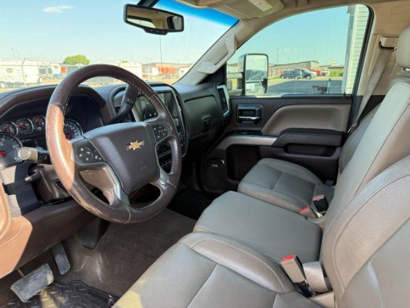 2015 GREEN /Jet Black Chevrolet Silverado 2500HD (1GC1KWE89FF) with an 66 engine, Automatic transmission, located at 1175 N Woodruff Ave, Idaho Falls, ID, 83401, 43.506901, -111.999657 - At Timberline Auto, finding a great deal on your next vehicle is always easy! Our experienced sales staff's goal is to help find you the right vehicle at the right price! Our knowledgeable finance department has options for almost any credit score. We offer extended service contract options to prote - Photo#30