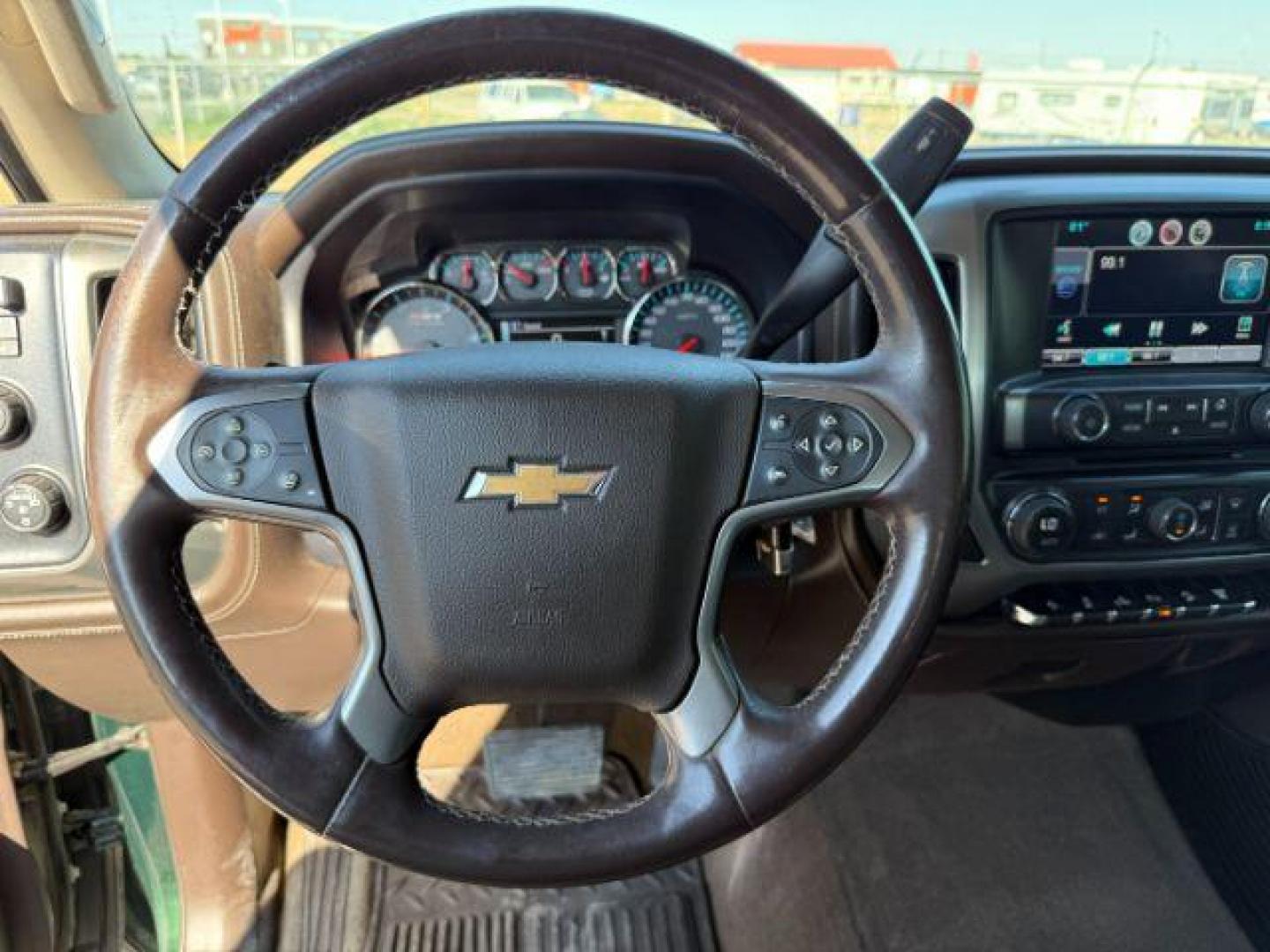 2015 GREEN /Jet Black Chevrolet Silverado 2500HD (1GC1KWE89FF) with an 66 engine, Automatic transmission, located at 1175 N Woodruff Ave, Idaho Falls, ID, 83401, 43.506901, -111.999657 - At Timberline Auto, finding a great deal on your next vehicle is always easy! Our experienced sales staff's goal is to help find you the right vehicle at the right price! Our knowledgeable finance department has options for almost any credit score. We offer extended service contract options to prote - Photo#31