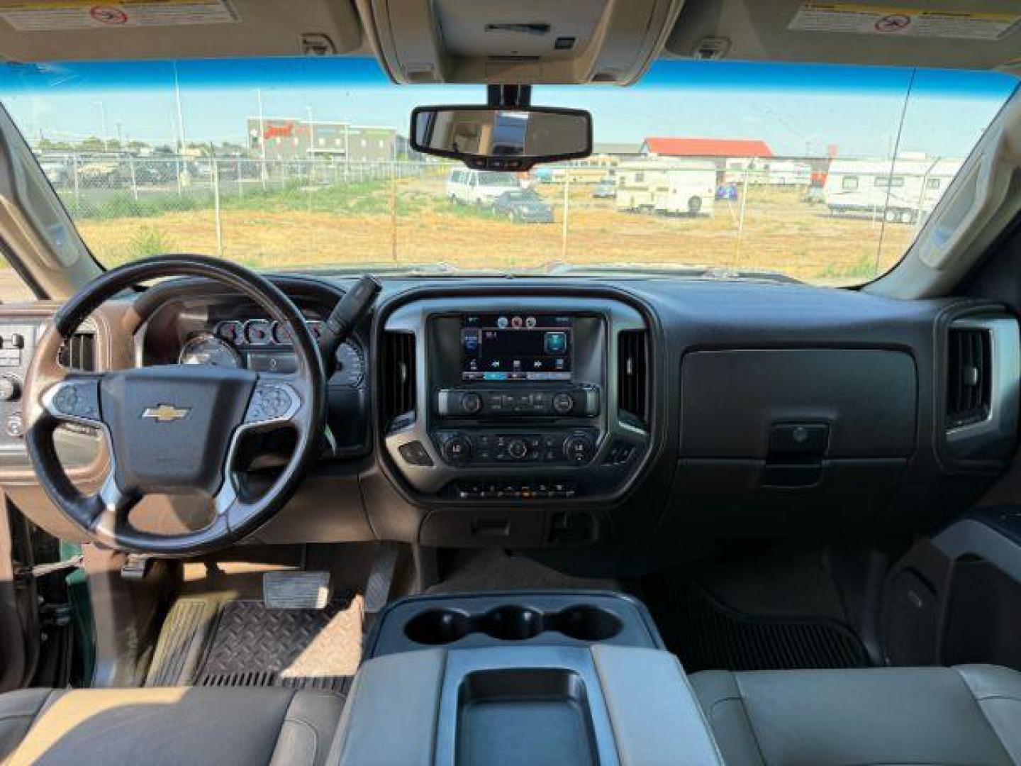 2015 GREEN /Jet Black Chevrolet Silverado 2500HD (1GC1KWE89FF) with an 66 engine, Automatic transmission, located at 1175 N Woodruff Ave, Idaho Falls, ID, 83401, 43.506901, -111.999657 - At Timberline Auto, finding a great deal on your next vehicle is always easy! Our experienced sales staff's goal is to help find you the right vehicle at the right price! Our knowledgeable finance department has options for almost any credit score. We offer extended service contract options to prote - Photo#35