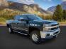 2015 GREEN /Jet Black Chevrolet Silverado 2500HD (1GC1KWE89FF) with an 66 engine, Automatic transmission, located at 1175 N Woodruff Ave, Idaho Falls, ID, 83401, 43.506901, -111.999657 - At Timberline Auto, finding a great deal on your next vehicle is always easy! Our experienced sales staff's goal is to help find you the right vehicle at the right price! Our knowledgeable finance department has options for almost any credit score. We offer extended service contract options to prote - Photo#7