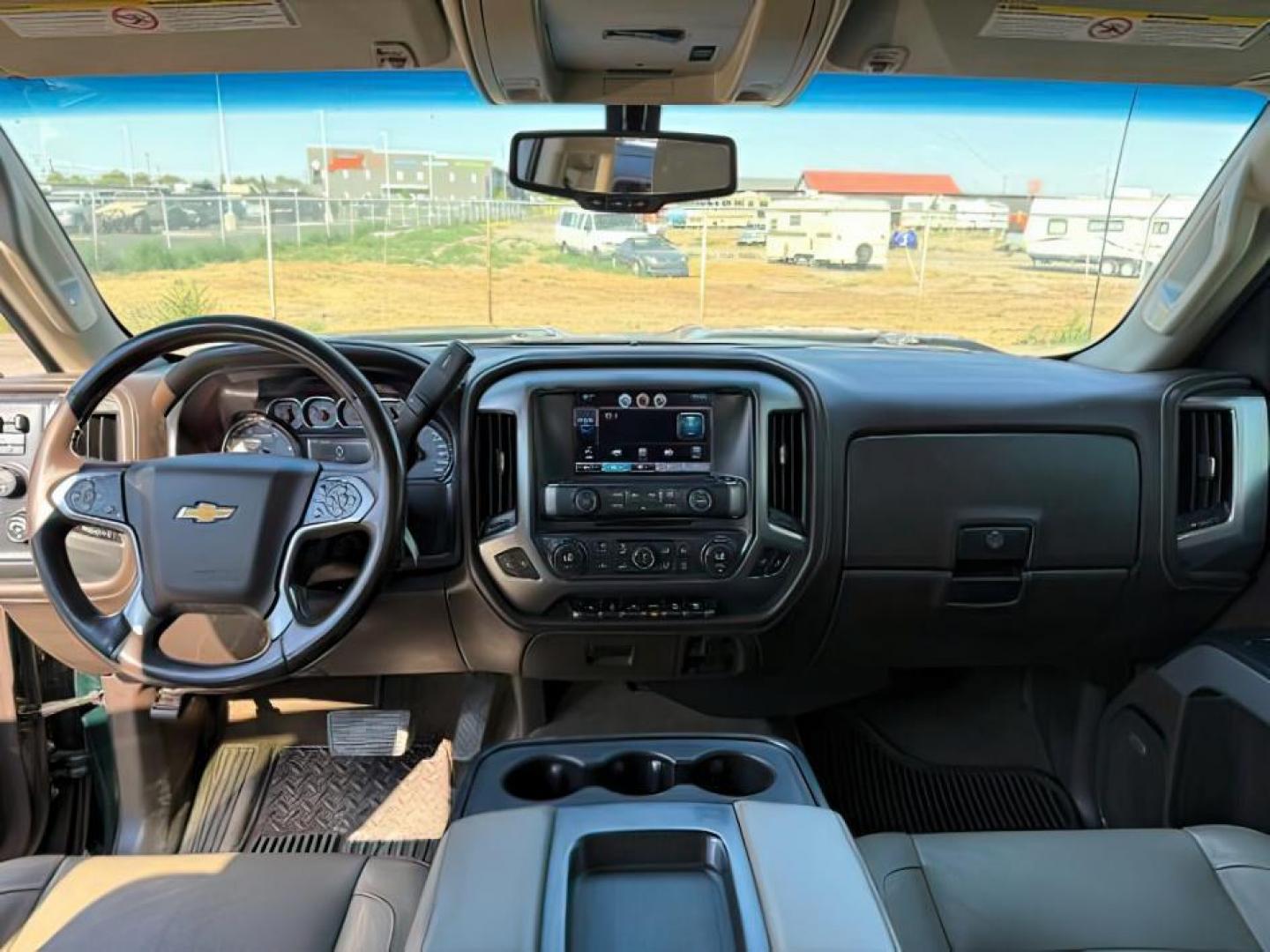 2015 GREEN /Jet Black Chevrolet Silverado 2500HD (1GC1KWE89FF) with an 66 engine, Automatic transmission, located at 1175 N Woodruff Ave, Idaho Falls, ID, 83401, 43.506901, -111.999657 - At Timberline Auto, finding a great deal on your next vehicle is always easy! Our experienced sales staff's goal is to help find you the right vehicle at the right price! Our knowledgeable finance department has options for almost any credit score. We offer extended service contract options to prote - Photo#16