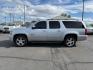 2013 Silver Ice Metallic /Light Cashmere/Dark Cashmere Chevrolet Suburban 1500 (1GNSCJE04DR) with an Vortec 53L V-8 variable valve control engine, Automatic transmission, located at 1175 N Woodruff Ave, Idaho Falls, ID, 83401, 43.506901, -111.999657 - At Timberline Auto, finding a great deal on your next vehicle is always easy! Our experienced sales staff's goal is to help find you the right vehicle at the right price! Our knowledgeable finance department has options for almost any credit score. We offer extended service contract options to prote - Photo#24