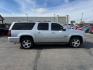 2013 Silver Ice Metallic /Light Cashmere/Dark Cashmere Chevrolet Suburban 1500 (1GNSCJE04DR) with an Vortec 53L V-8 variable valve control engine, Automatic transmission, located at 1175 N Woodruff Ave, Idaho Falls, ID, 83401, 43.506901, -111.999657 - At Timberline Auto, finding a great deal on your next vehicle is always easy! Our experienced sales staff's goal is to help find you the right vehicle at the right price! Our knowledgeable finance department has options for almost any credit score. We offer extended service contract options to prote - Photo#29