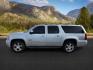 2013 Silver Ice Metallic /Light Cashmere/Dark Cashmere Chevrolet Suburban 1500 (1GNSCJE04DR) with an Vortec 53L V-8 variable valve control engine, Automatic transmission, located at 1175 N Woodruff Ave, Idaho Falls, ID, 83401, 43.506901, -111.999657 - At Timberline Auto, finding a great deal on your next vehicle is always easy! Our experienced sales staff's goal is to help find you the right vehicle at the right price! Our knowledgeable finance department has options for almost any credit score. We offer extended service contract options to prote - Photo#2
