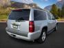 2013 Silver Ice Metallic /Light Cashmere/Dark Cashmere Chevrolet Suburban 1500 (1GNSCJE04DR) with an Vortec 53L V-8 variable valve control engine, Automatic transmission, located at 1175 N Woodruff Ave, Idaho Falls, ID, 83401, 43.506901, -111.999657 - At Timberline Auto, finding a great deal on your next vehicle is always easy! Our experienced sales staff's goal is to help find you the right vehicle at the right price! Our knowledgeable finance department has options for almost any credit score. We offer extended service contract options to prote - Photo#6