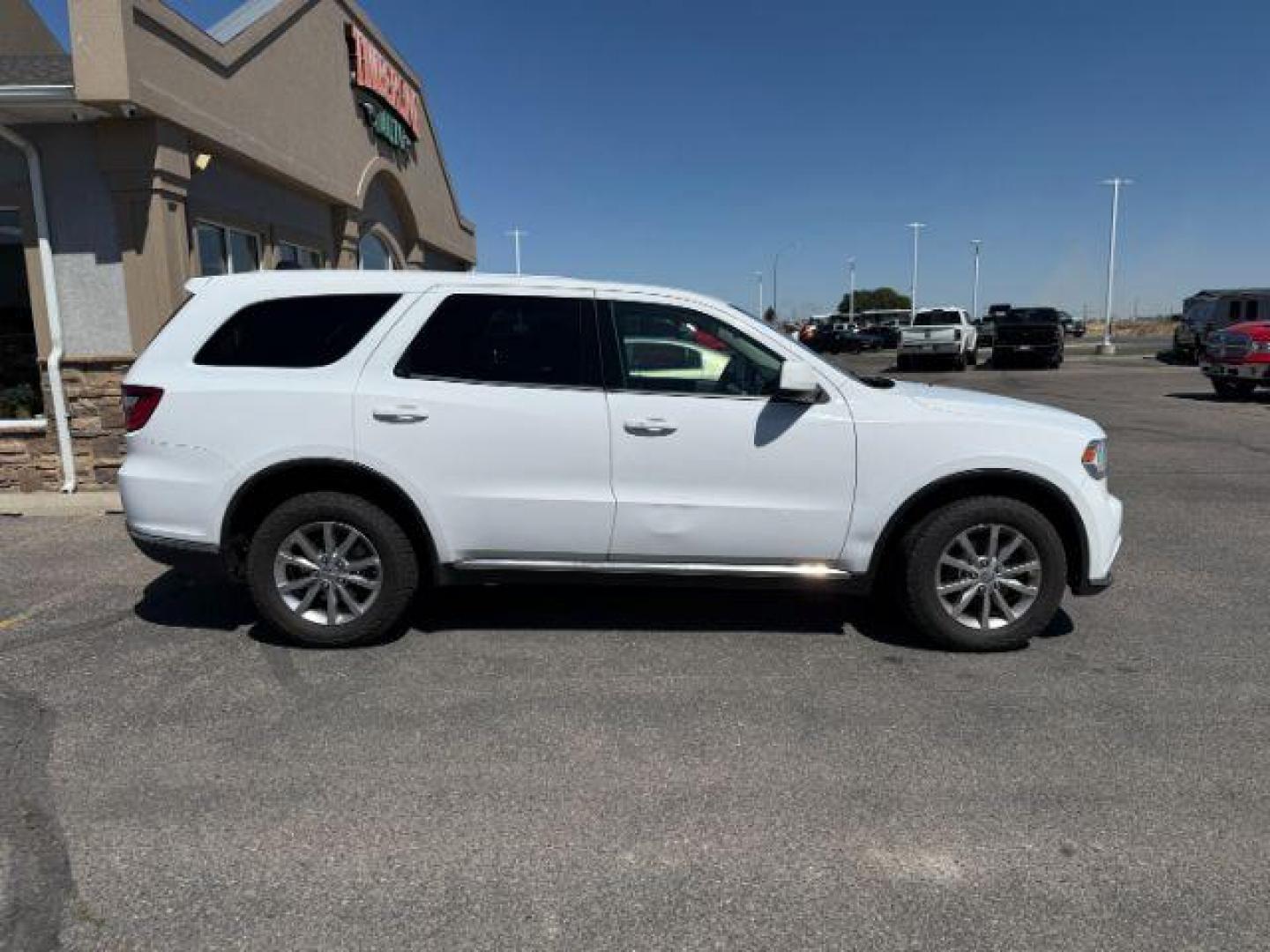 2017 Vice White Tri-Coat Pearl /Black Dodge Durango (1C4RDJAG5HC) with an Pentastar 36L V-6 DOHC engine, Automatic transmission, located at 1175 N Woodruff Ave, Idaho Falls, ID, 83401, 43.506901, -111.999657 - At Timberline Auto, finding a great deal on your next vehicle is always easy! Our experienced sales staff's goal is to help find you the right vehicle at the right price! Our knowledgeable finance department has options for almost any credit score. We offer extended service contract options to prote - Photo#26
