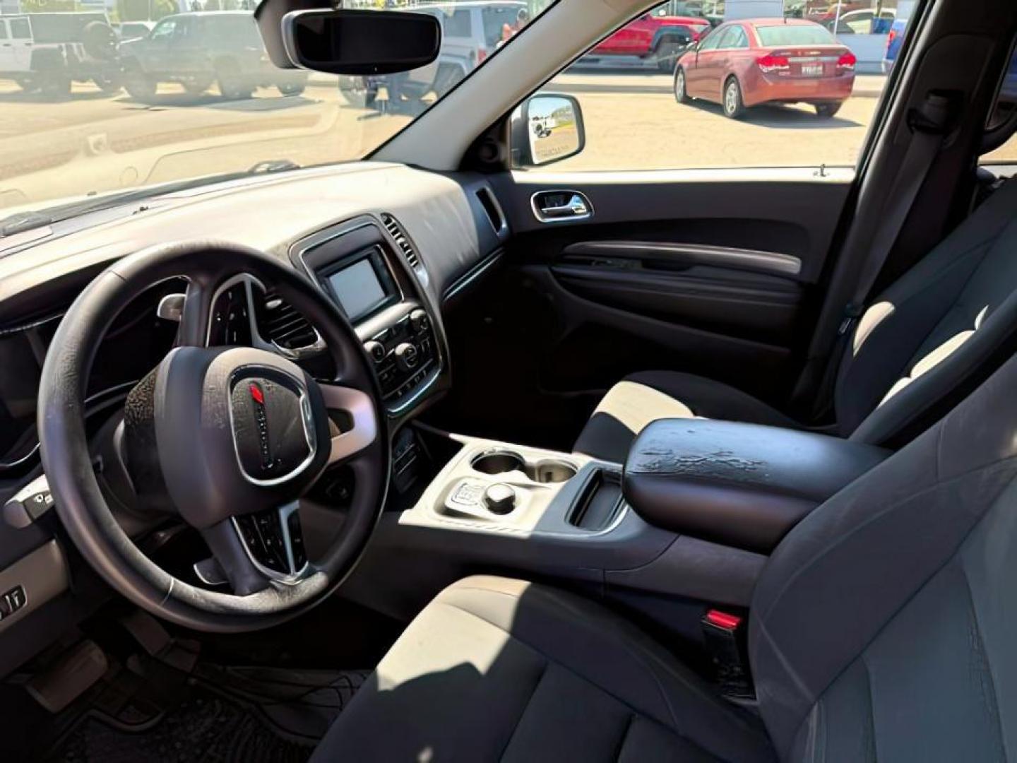 2017 Vice White Tri-Coat Pearl /Black Dodge Durango (1C4RDJAG5HC) with an Pentastar 36L V-6 DOHC engine, Automatic transmission, located at 1175 N Woodruff Ave, Idaho Falls, ID, 83401, 43.506901, -111.999657 - At Timberline Auto, finding a great deal on your next vehicle is always easy! Our experienced sales staff's goal is to help find you the right vehicle at the right price! Our knowledgeable finance department has options for almost any credit score. We offer extended service contract options to prote - Photo#12