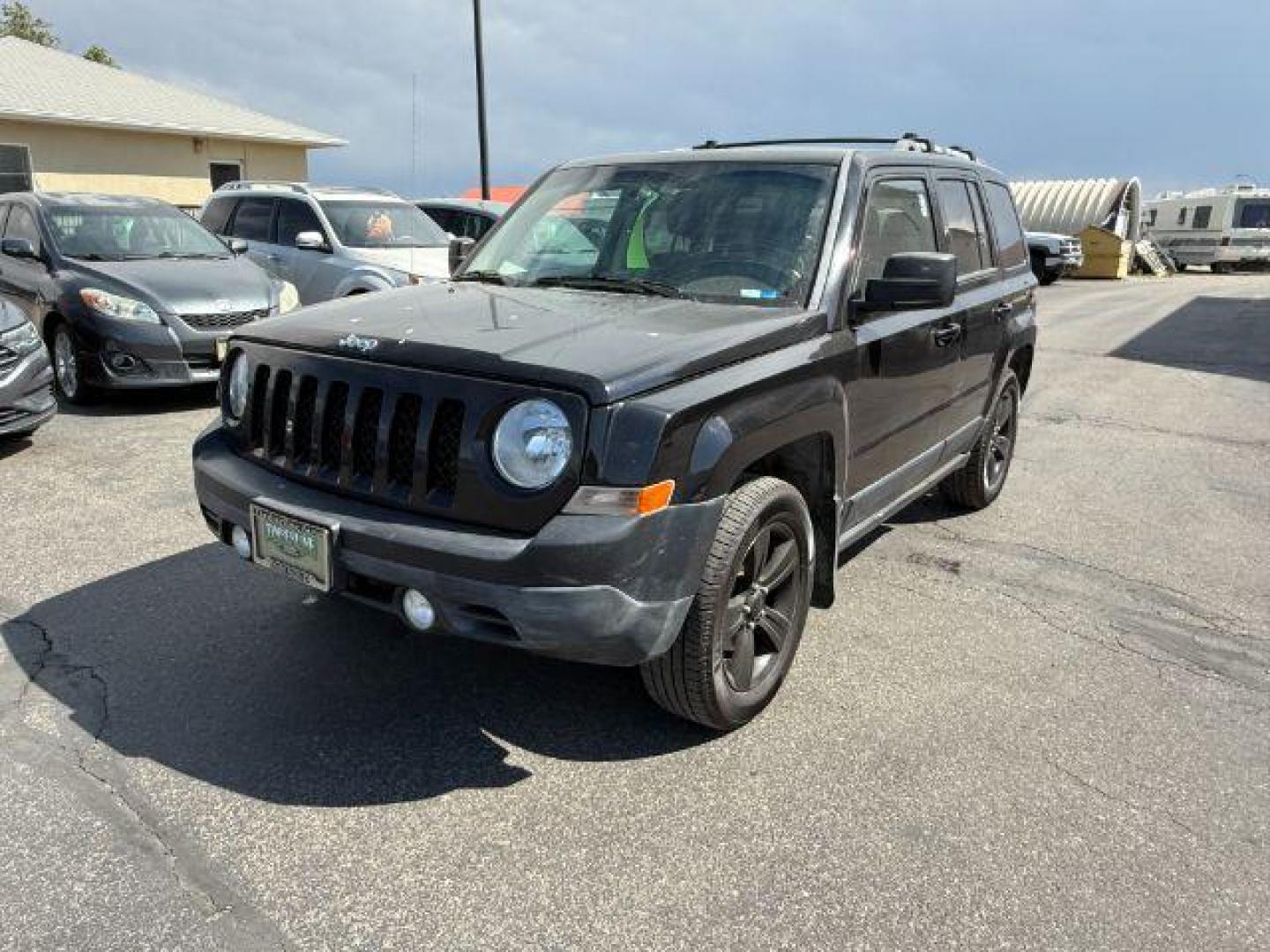 2012 Black /Dark Slate Gray Cloth Interior Jeep Patriot (1C4NJRFB6CD) with an 24L L4 DOHC 16V engine, located at 1175 N Woodruff Ave, Idaho Falls, ID, 83401, 43.506901, -111.999657 - Photo#19