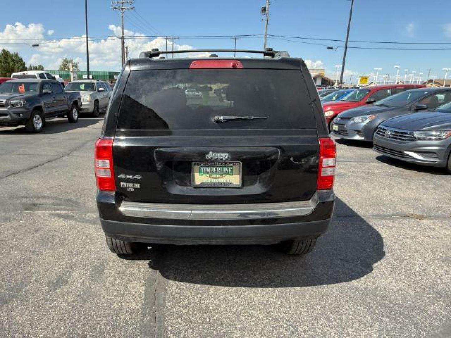 2012 Black /Dark Slate Gray Cloth Interior Jeep Patriot (1C4NJRFB6CD) with an 24L L4 DOHC 16V engine, located at 1175 N Woodruff Ave, Idaho Falls, ID, 83401, 43.506901, -111.999657 - Photo#22
