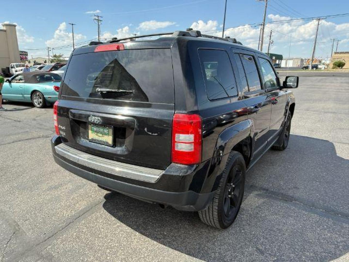 2012 Black /Dark Slate Gray Cloth Interior Jeep Patriot (1C4NJRFB6CD) with an 24L L4 DOHC 16V engine, located at 1175 N Woodruff Ave, Idaho Falls, ID, 83401, 43.506901, -111.999657 - Photo#24