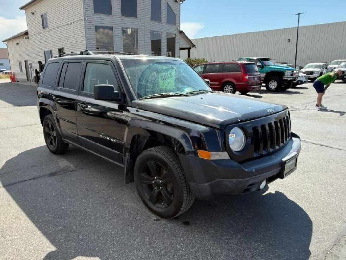 2012 Black /Dark Slate Gray Cloth Interior Jeep Patriot (1C4NJRFB6CD) with an 24L L4 DOHC 16V engine, located at 1175 N Woodruff Ave, Idaho Falls, ID, 83401, 43.506901, -111.999657 - Photo#26