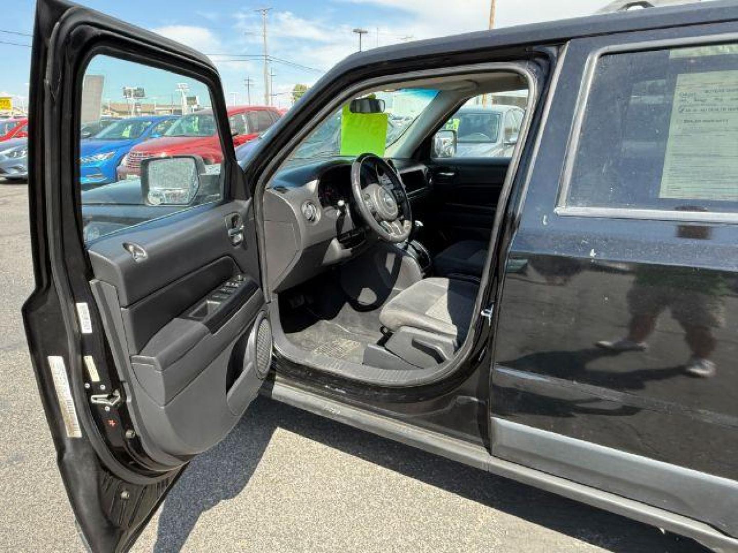 2012 Black /Dark Slate Gray Cloth Interior Jeep Patriot (1C4NJRFB6CD) with an 24L L4 DOHC 16V engine, located at 1175 N Woodruff Ave, Idaho Falls, ID, 83401, 43.506901, -111.999657 - Photo#29