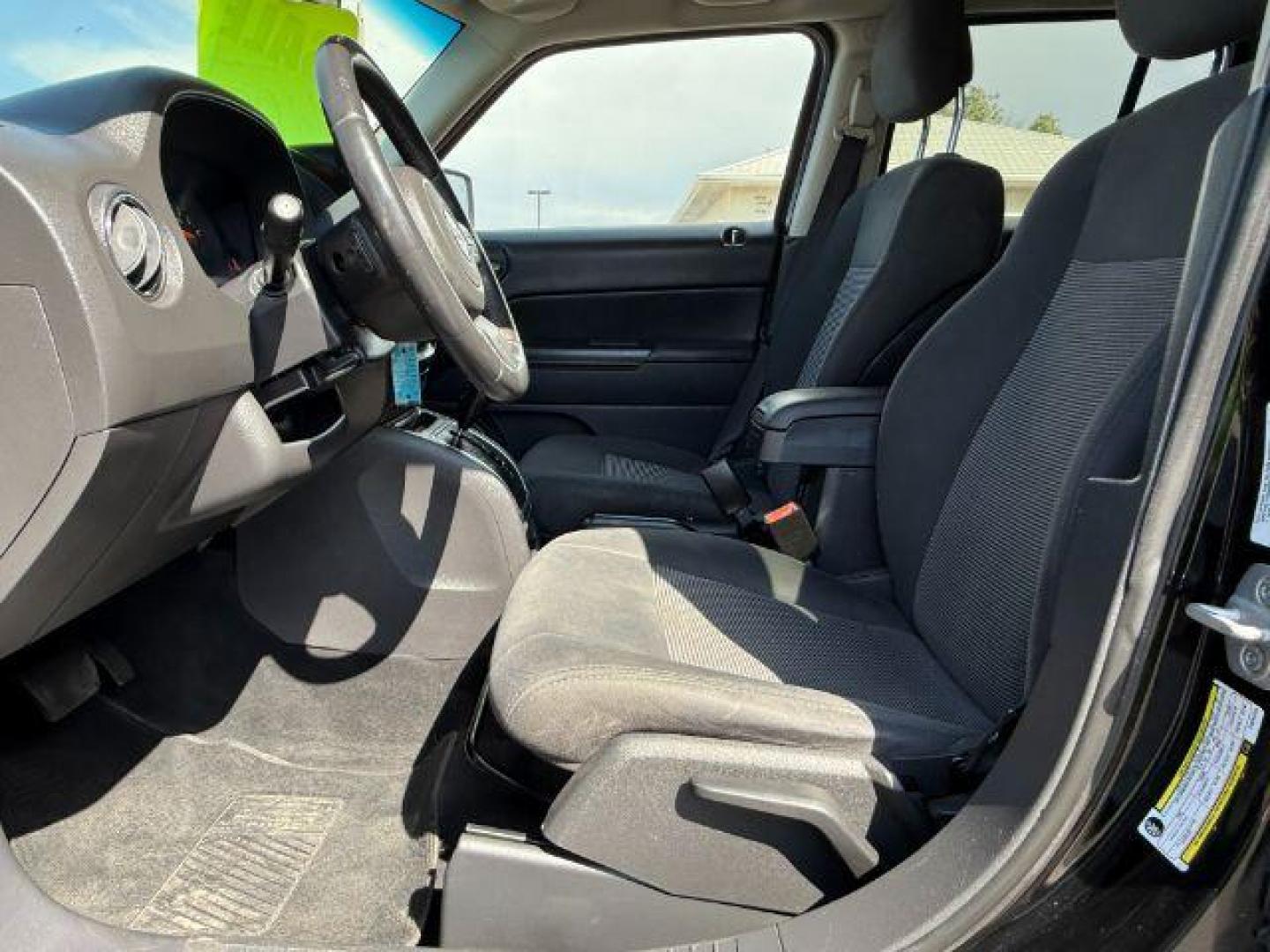 2012 Black /Dark Slate Gray Cloth Interior Jeep Patriot (1C4NJRFB6CD) with an 24L L4 DOHC 16V engine, located at 1175 N Woodruff Ave, Idaho Falls, ID, 83401, 43.506901, -111.999657 - Photo#30