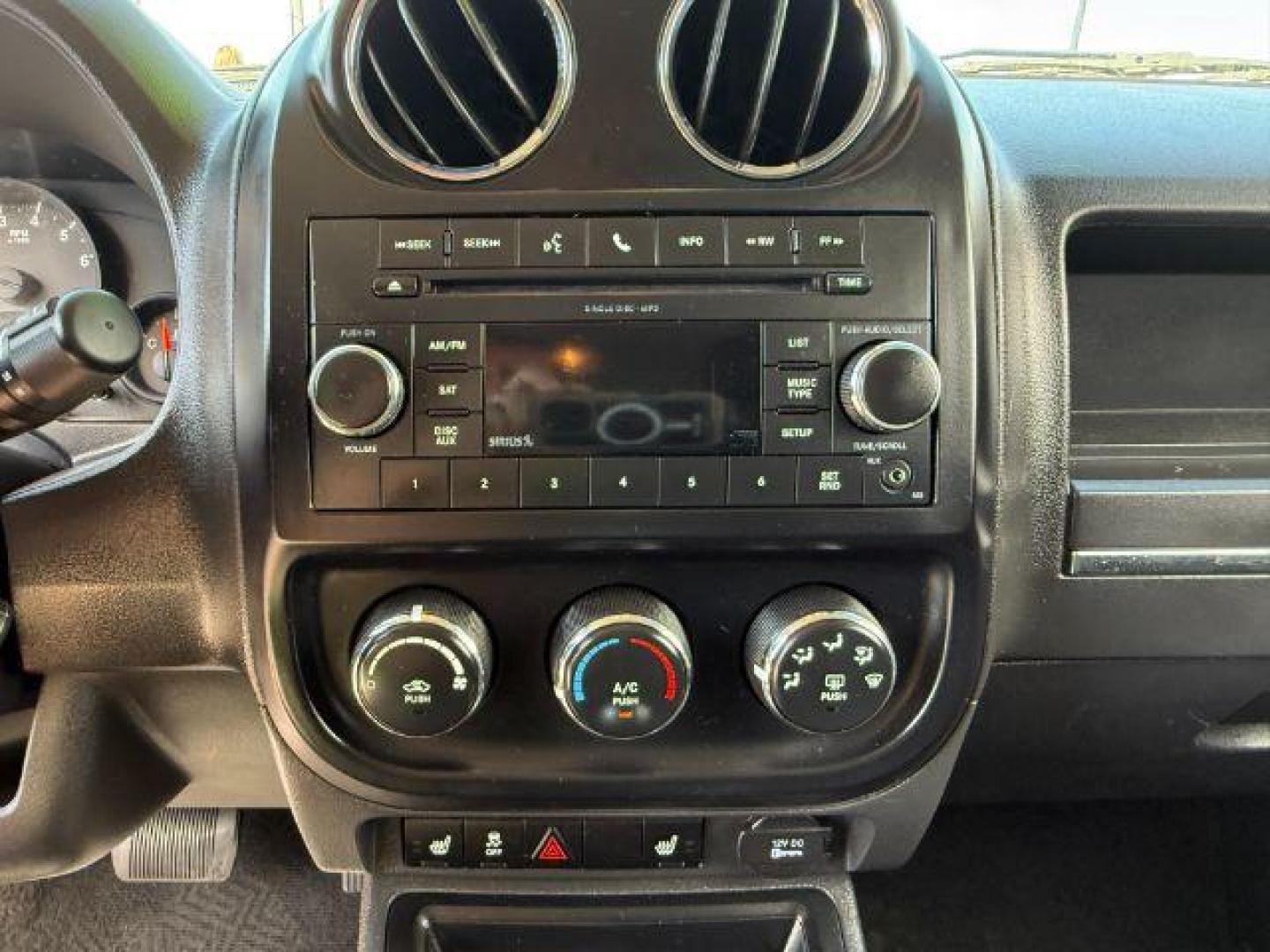 2012 Black /Dark Slate Gray Cloth Interior Jeep Patriot (1C4NJRFB6CD) with an 24L L4 DOHC 16V engine, located at 1175 N Woodruff Ave, Idaho Falls, ID, 83401, 43.506901, -111.999657 - Photo#33