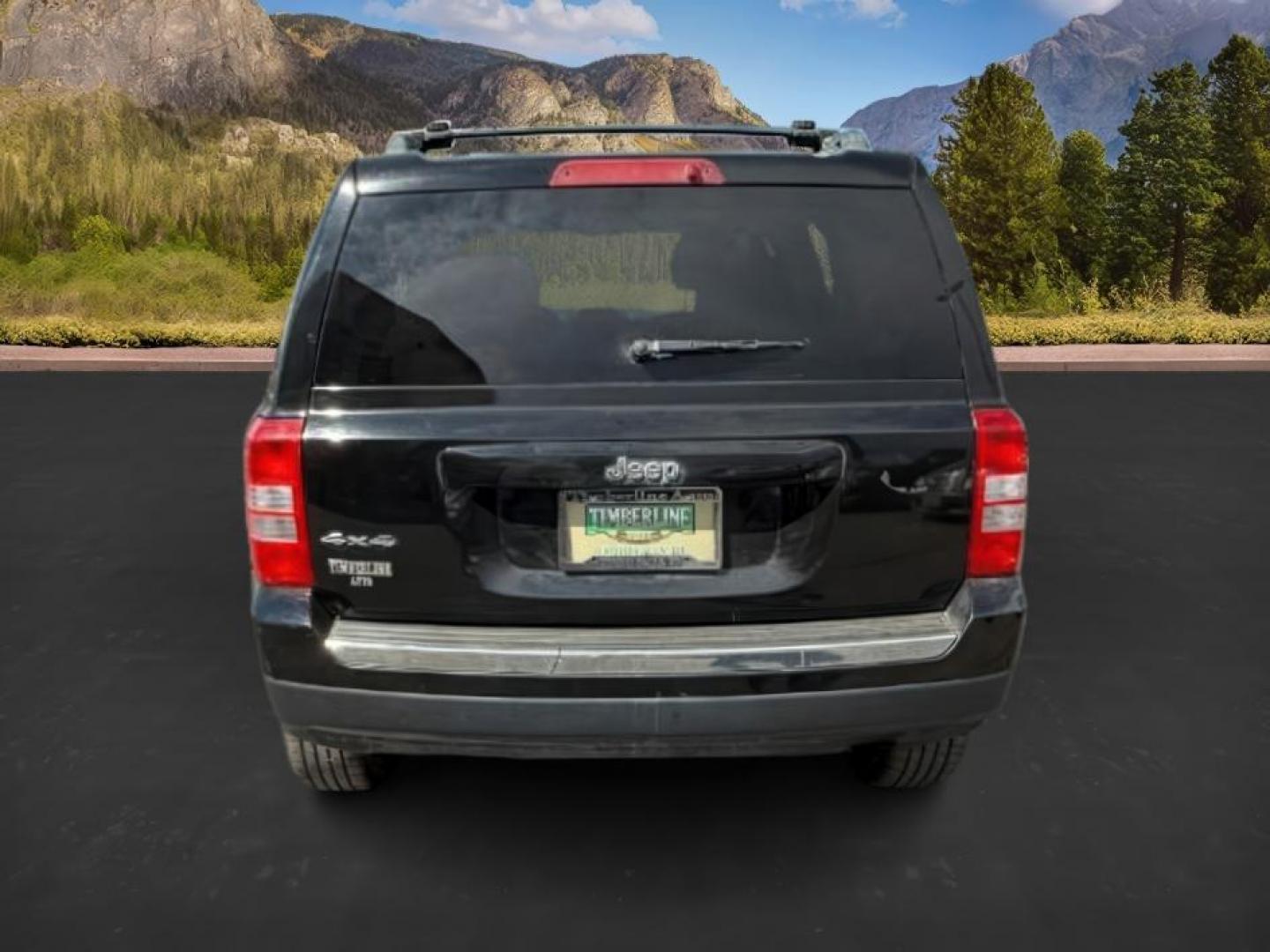 2012 Black /Dark Slate Gray Cloth Interior Jeep Patriot (1C4NJRFB6CD) with an 24L L4 DOHC 16V engine, located at 1175 N Woodruff Ave, Idaho Falls, ID, 83401, 43.506901, -111.999657 - Photo#3