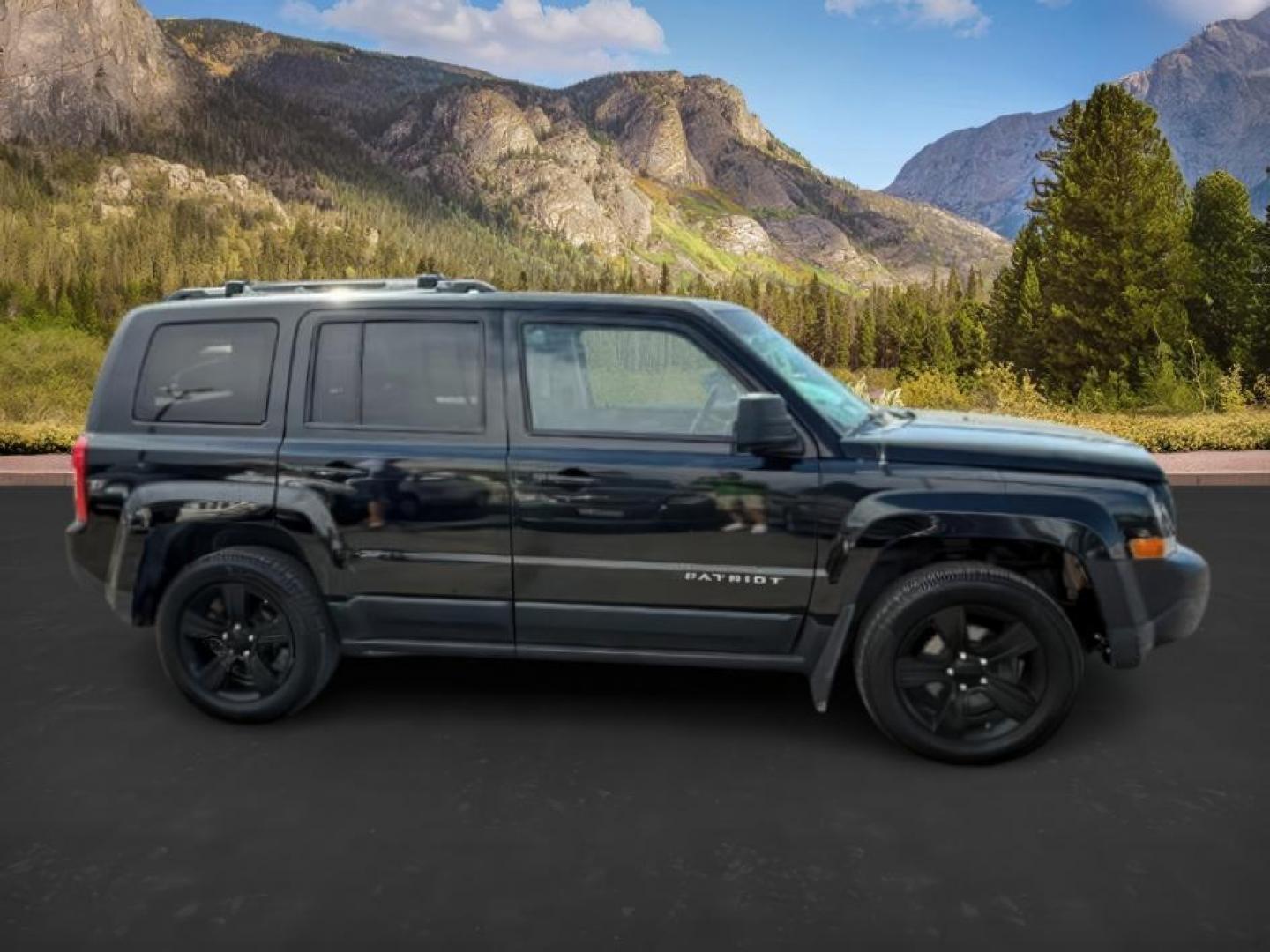 2012 Black /Dark Slate Gray Cloth Interior Jeep Patriot (1C4NJRFB6CD) with an 24L L4 DOHC 16V engine, located at 1175 N Woodruff Ave, Idaho Falls, ID, 83401, 43.506901, -111.999657 - Photo#6