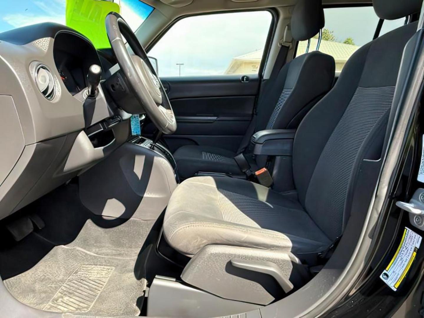 2012 Black /Dark Slate Gray Cloth Interior Jeep Patriot (1C4NJRFB6CD) with an 24L L4 DOHC 16V engine, located at 1175 N Woodruff Ave, Idaho Falls, ID, 83401, 43.506901, -111.999657 - Photo#11