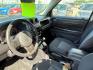 2012 Black /Dark Slate Gray Cloth Interior Jeep Patriot (1C4NJRFB6CD) with an 24L L4 DOHC 16V engine, located at 1175 N Woodruff Ave, Idaho Falls, ID, 83401, 43.506901, -111.999657 - Photo#12