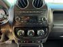 2012 Black /Dark Slate Gray Cloth Interior Jeep Patriot (1C4NJRFB6CD) with an 24L L4 DOHC 16V engine, located at 1175 N Woodruff Ave, Idaho Falls, ID, 83401, 43.506901, -111.999657 - Photo#14