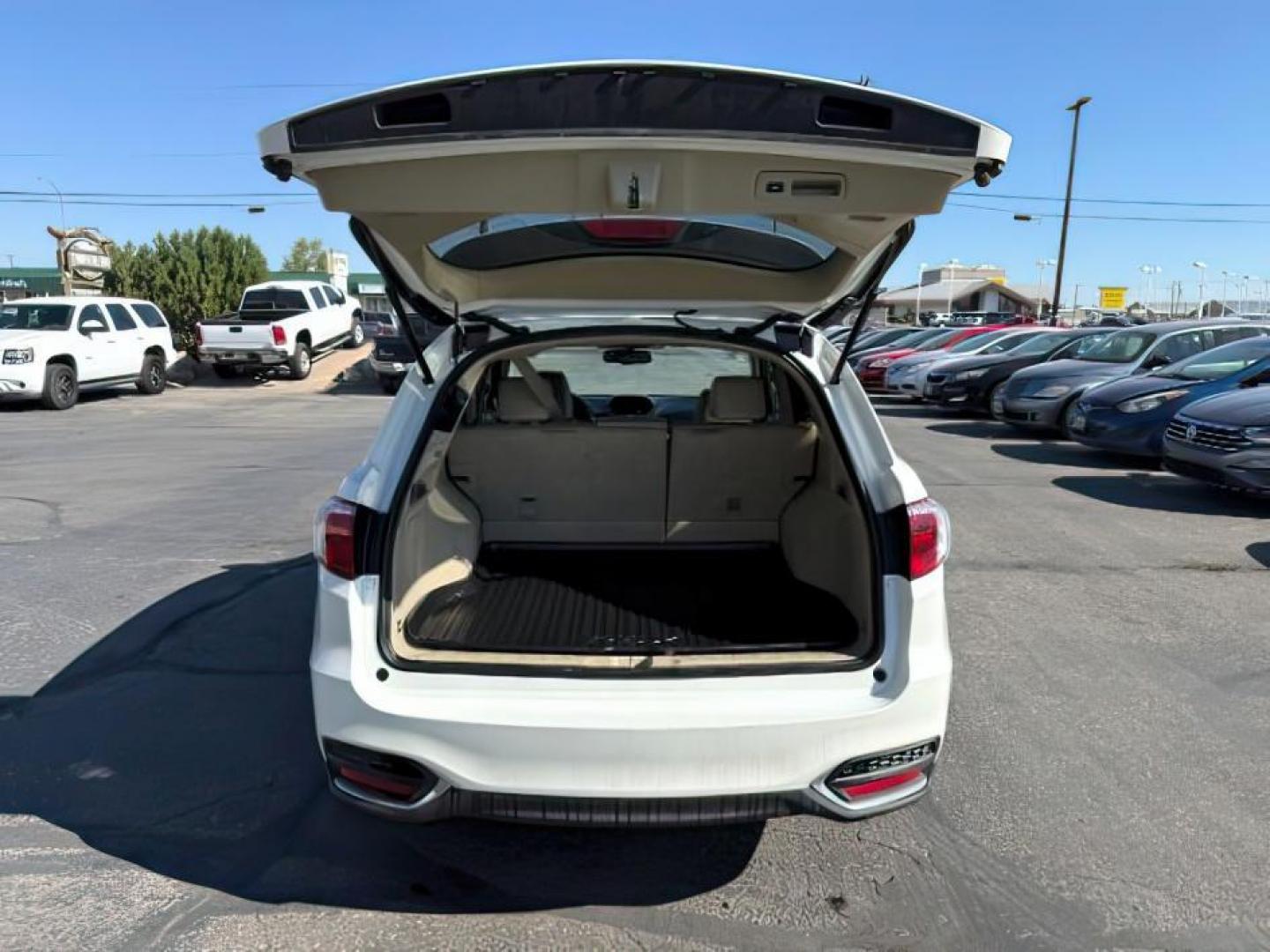 2016 White Diamond Pearl /Ebony Acura RDX (5J8TB4H30GL) with an 35L V-6 i-VTEC variable valve control engine, Automatic transmission, located at 1175 N Woodruff Ave, Idaho Falls, ID, 83401, 43.506901, -111.999657 - At Timberline Auto, finding a great deal on your next vehicle is always easy! Our experienced sales staff's goal is to help find you the right vehicle at the right price! Our knowledgeable finance department has options for almost any credit score. We offer extended service contract options to prote - Photo#4