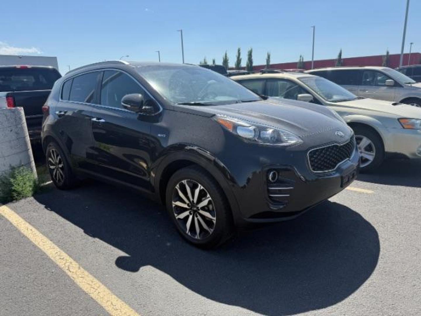 2019 BLACK /Black KIA Sportage (KNDPNCAC0K7) with an Theta II 24L I-4 gasoline direct injection engine, Automatic transmission, located at 1175 N Woodruff Ave, Idaho Falls, ID, 83401, 43.506901, -111.999657 - At Timberline Auto, finding a great deal on your next vehicle is always easy! Our experienced sales staff's goal is to help find you the right vehicle at the right price! Our knowledgeable finance department has options for almost any credit score. We offer extended service contract options to prote - Photo#0