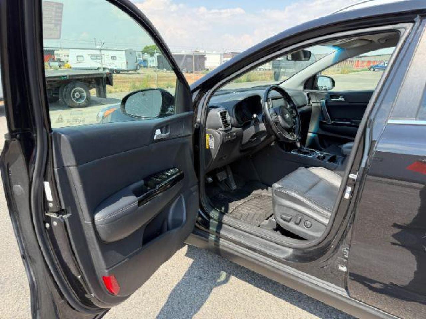 2019 BLACK /Black KIA Sportage (KNDPNCAC0K7) with an Theta II 24L I-4 gasoline direct injection engine, Automatic transmission, located at 1175 N Woodruff Ave, Idaho Falls, ID, 83401, 43.506901, -111.999657 - At Timberline Auto, finding a great deal on your next vehicle is always easy! Our experienced sales staff's goal is to help find you the right vehicle at the right price! Our knowledgeable finance department has options for almost any credit score. We offer extended service contract options to prote - Photo#36