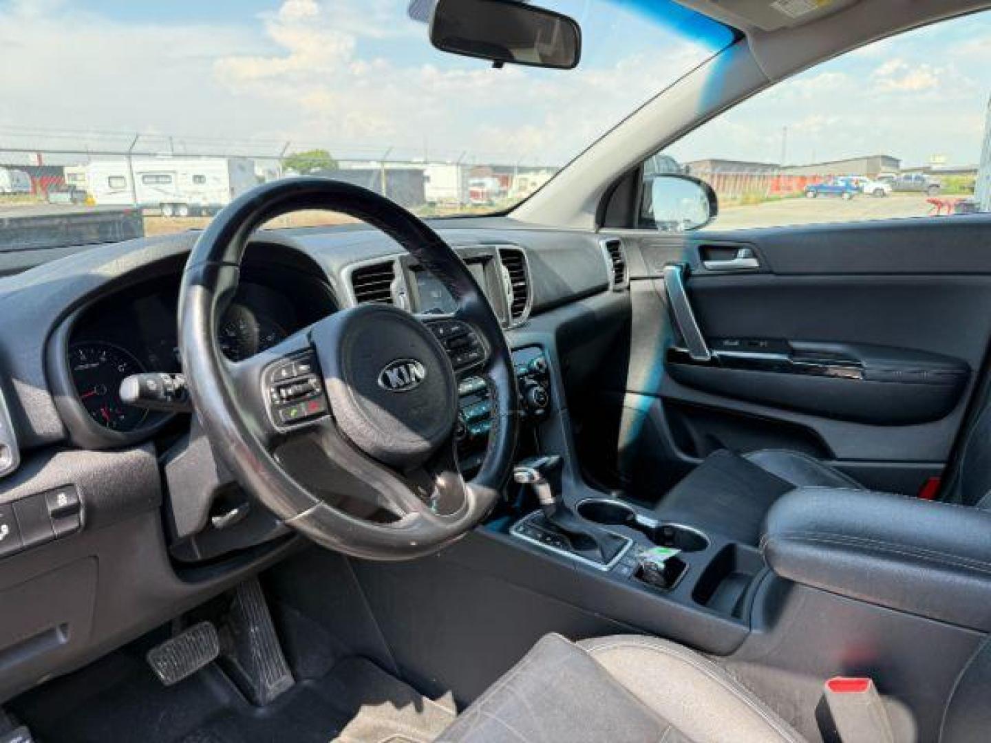 2019 BLACK /Black KIA Sportage (KNDPNCAC0K7) with an Theta II 24L I-4 gasoline direct injection engine, Automatic transmission, located at 1175 N Woodruff Ave, Idaho Falls, ID, 83401, 43.506901, -111.999657 - At Timberline Auto, finding a great deal on your next vehicle is always easy! Our experienced sales staff's goal is to help find you the right vehicle at the right price! Our knowledgeable finance department has options for almost any credit score. We offer extended service contract options to prote - Photo#38